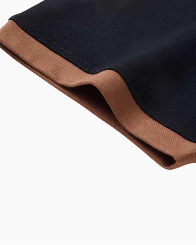 men's relaxed fit short sleeve polo with contrast collar, placket, and cuffs