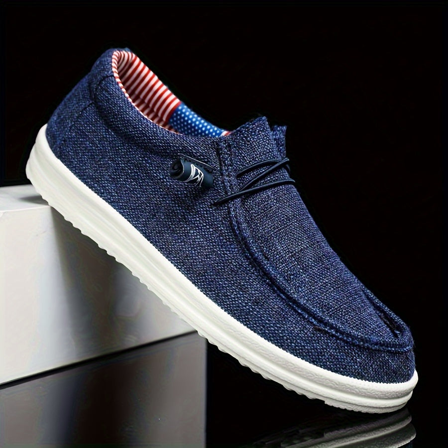 men's slip-on low-top footwear with elastic lace detail and flat sole