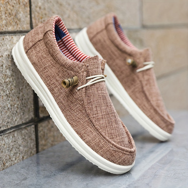 men's slip-on low-top footwear with elastic lace detail and flat sole