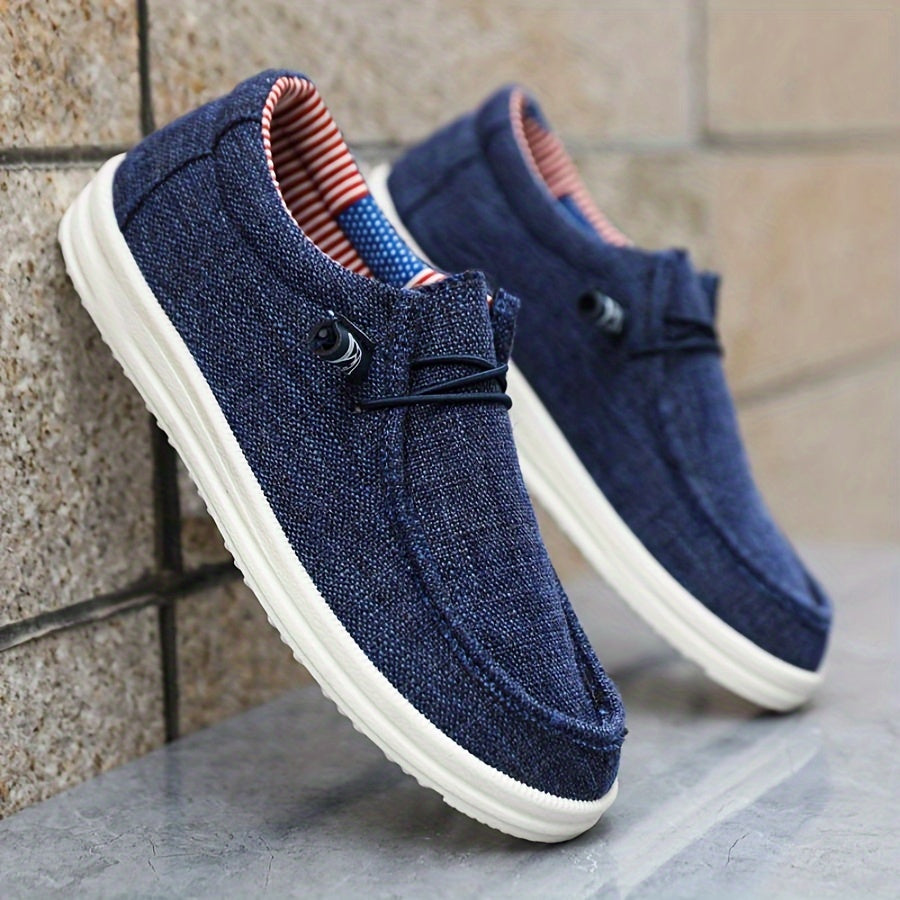 men's slip-on low-top footwear with elastic lace detail and flat sole