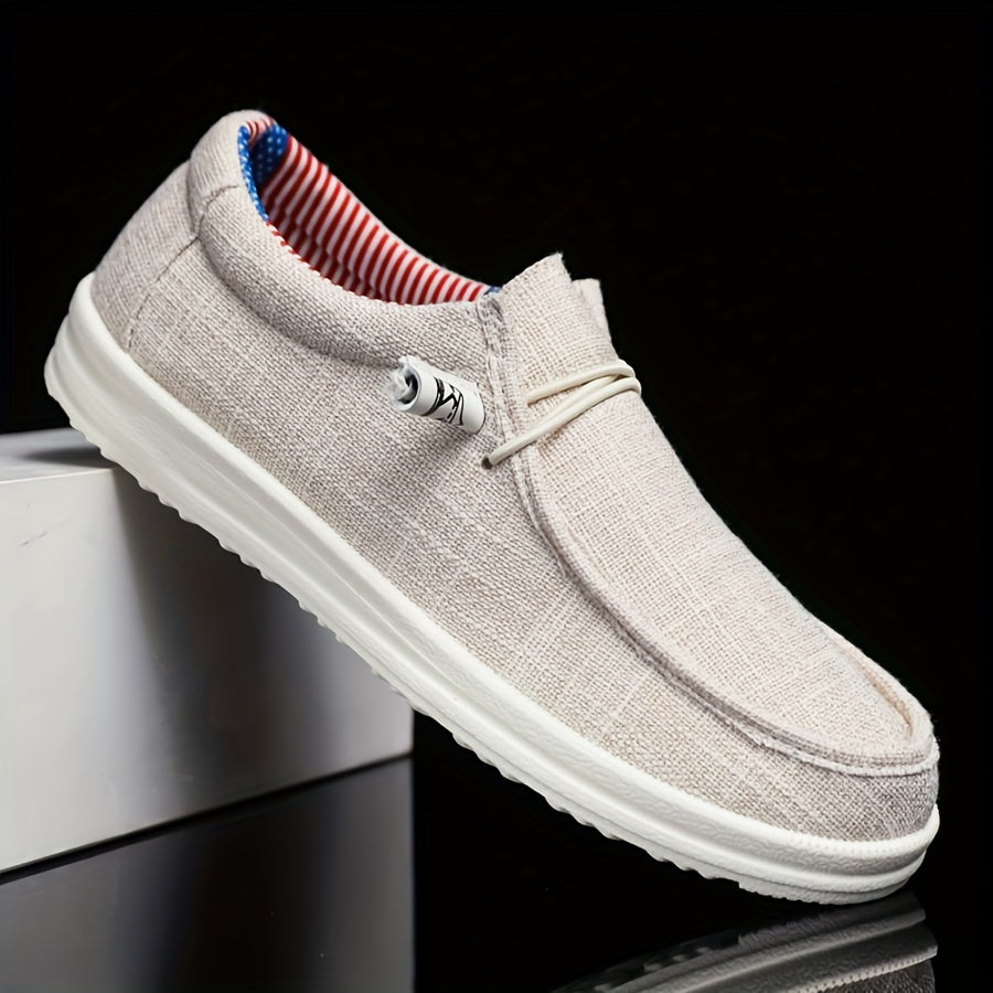men's slip-on low-top footwear with elastic lace detail and flat sole